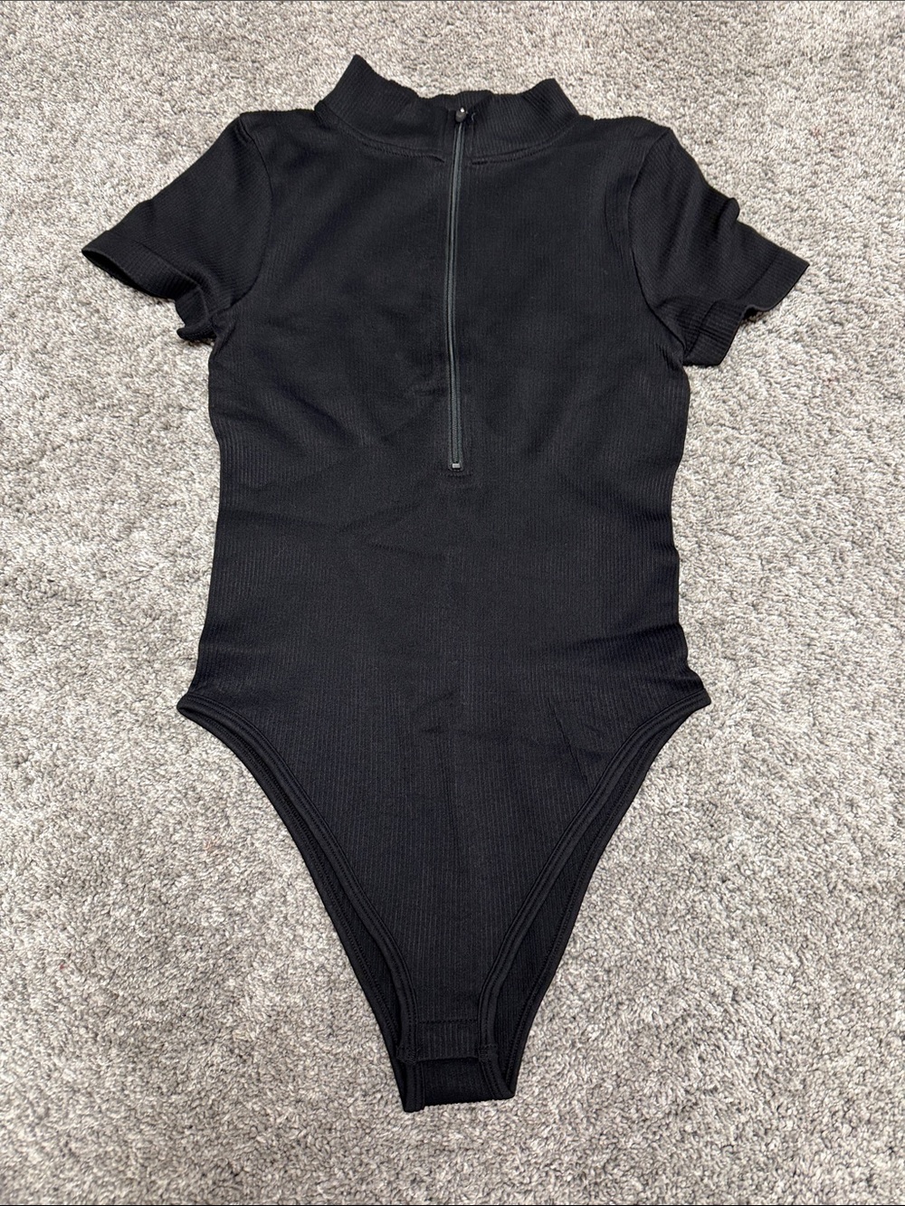 OQQ Black Ribbed Zip-Front One-Piece